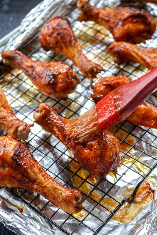 An easy keto and low carb friendly approach to getting crispy, flavorful, BBQ chicken drumsticks without having to use a fryer!