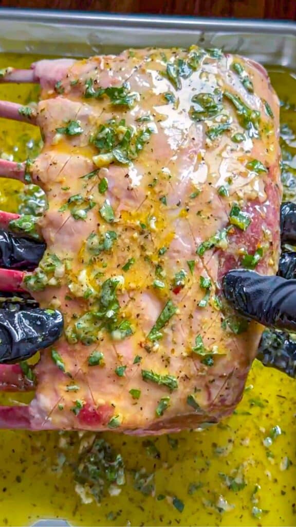 preparing the lamb in the marinade