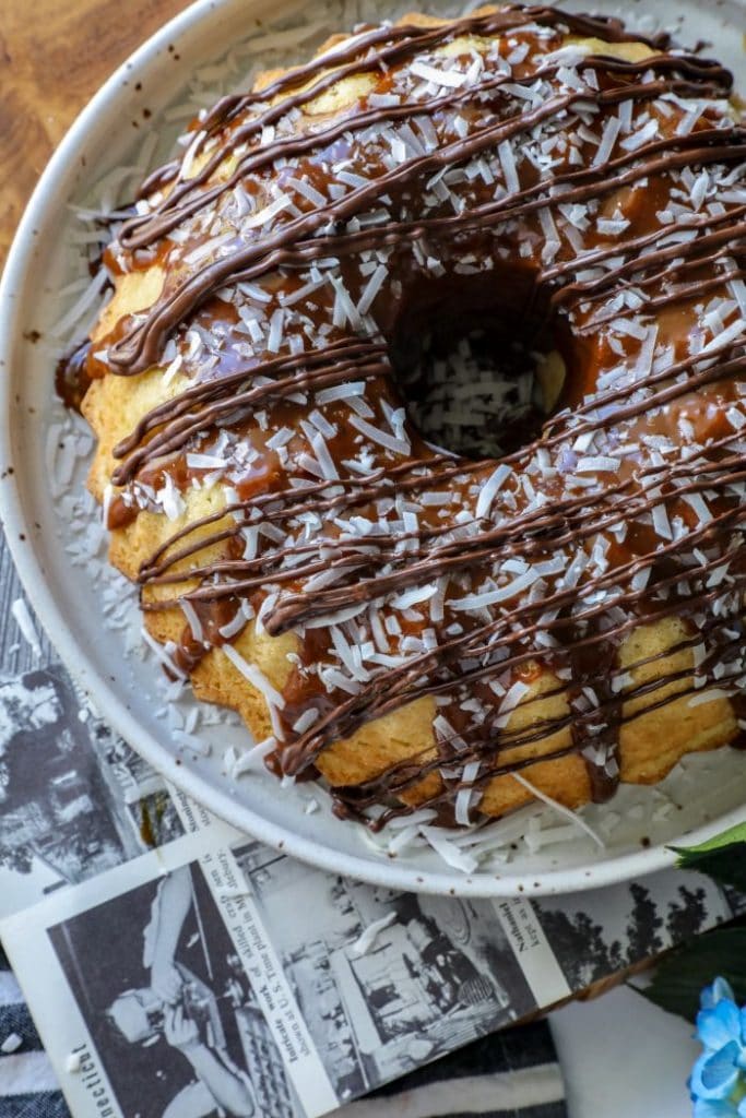 Fully decorated keto samoa bundt cake, close up, on a plate.