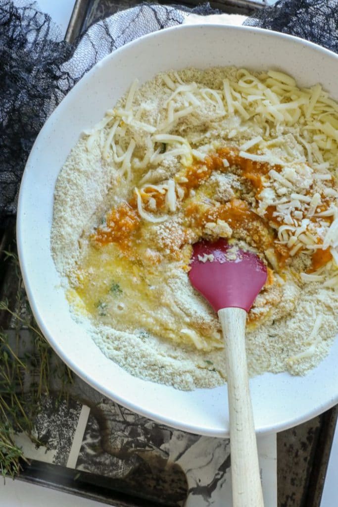 Bowl of the dry and wet ingredients for the savory pumpkin cornbread