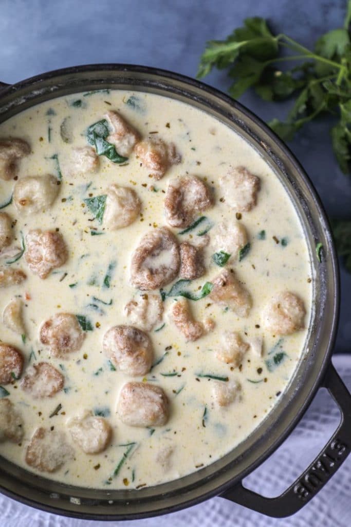 A finished pot of Easy Homemade Chicken Cauliflower Gnocchi Soup