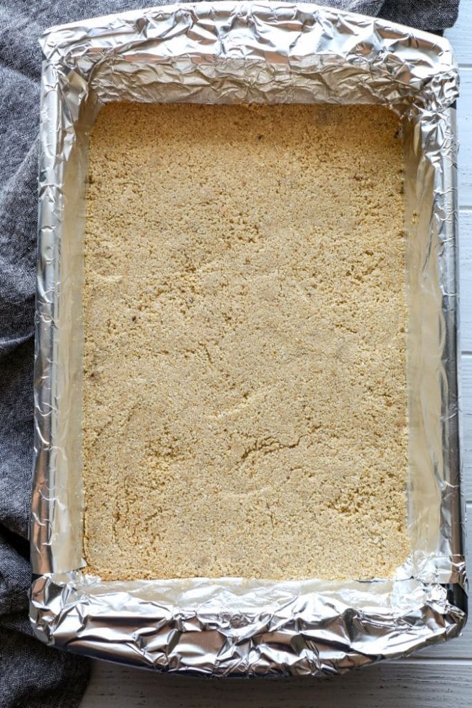 Keto Graham Cracker Crust in a 9x13 inch pan.