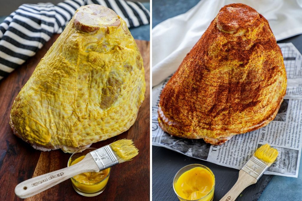 Prepping a spiral cut ham with mustard and BBQ rub for the smoker