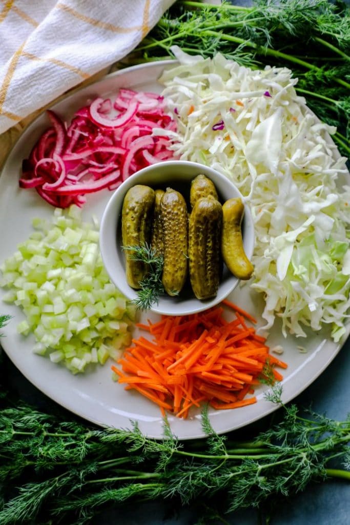Dill Pickle Coleslaw ingredients on a plater