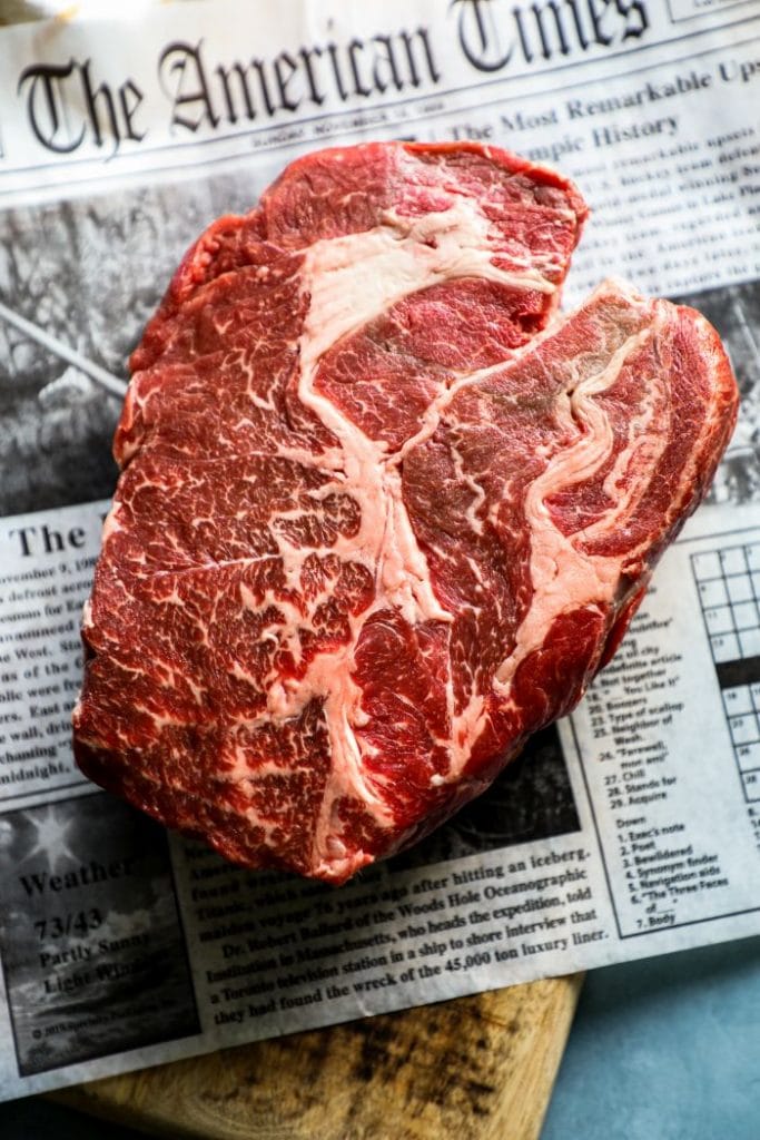 Raw chuck roast on butcher paper