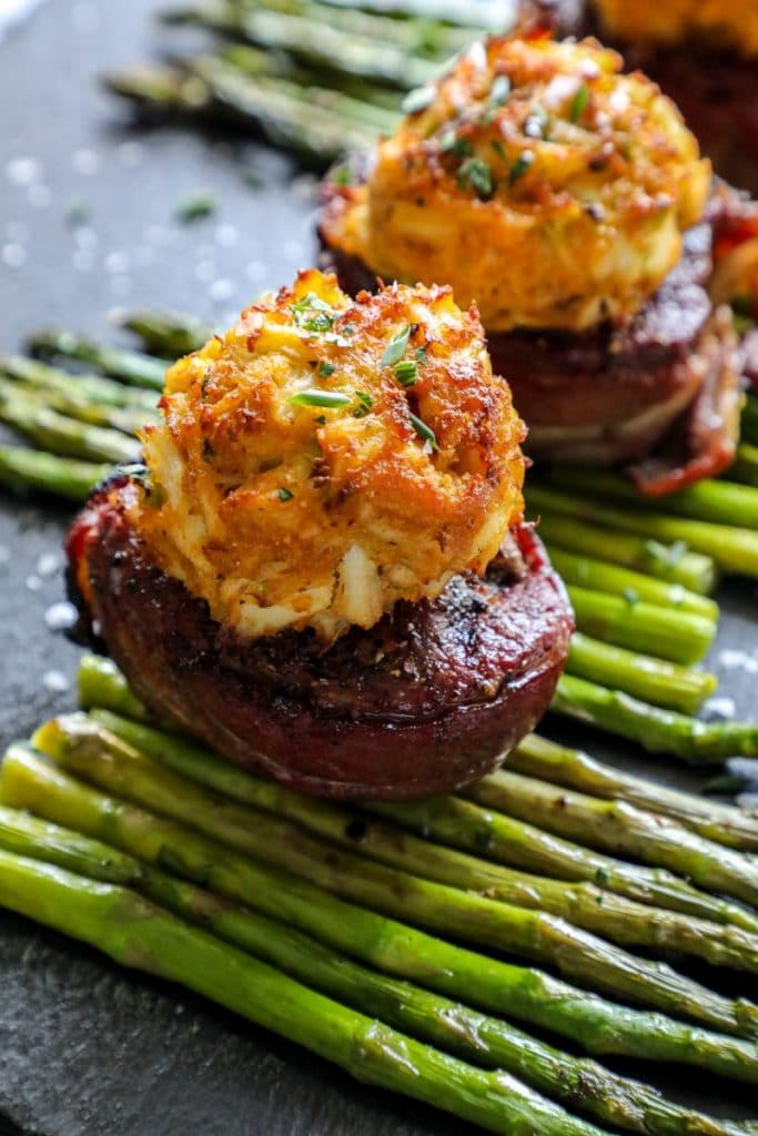 Easy Air Fryer Crab Cakes over a filet mignon steak
