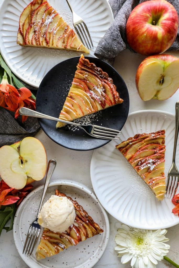 Slices of the gluten free apple tart on plates.