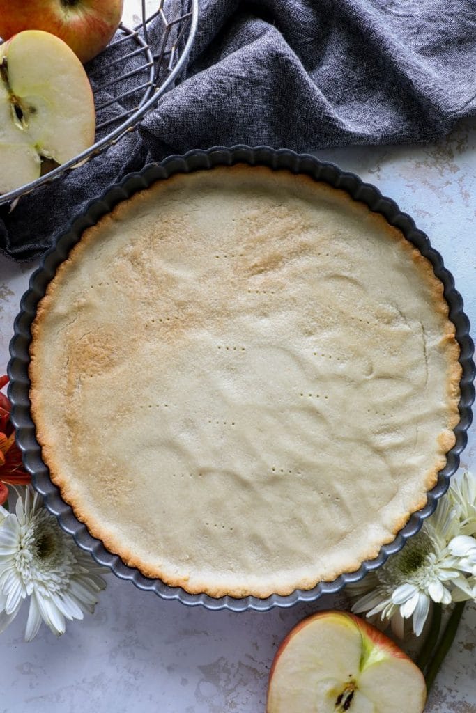 Baked gluten free crust in the tart pan