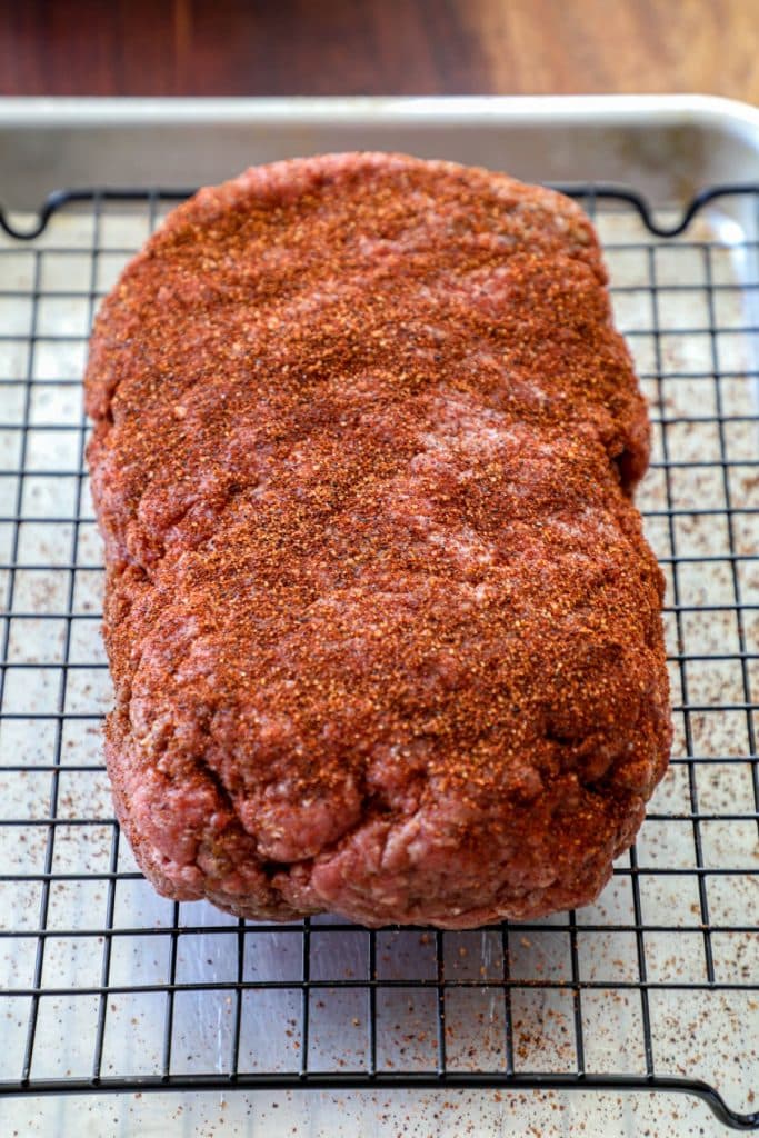 Shaping the ground beef for over the top chili into a meat loaf shape