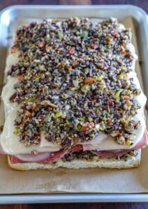 fully assembled muffuletta sliders