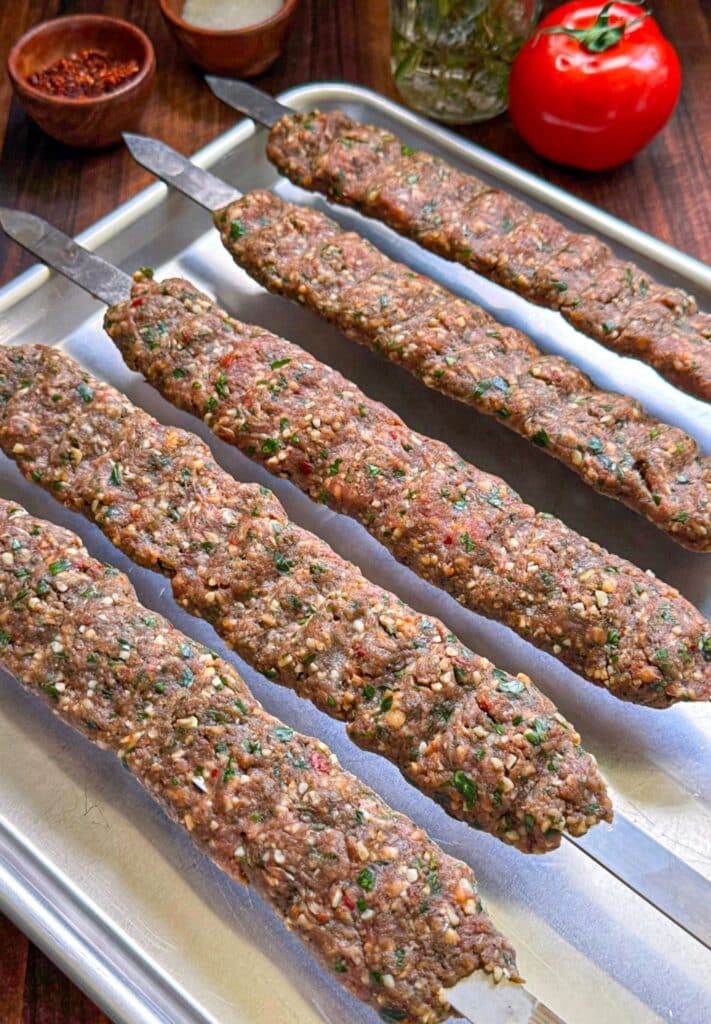 assembling the kofta beef kebabs