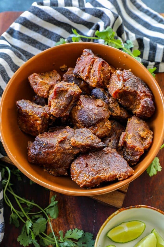 crispy golden brown carnitas made in a dutch oven