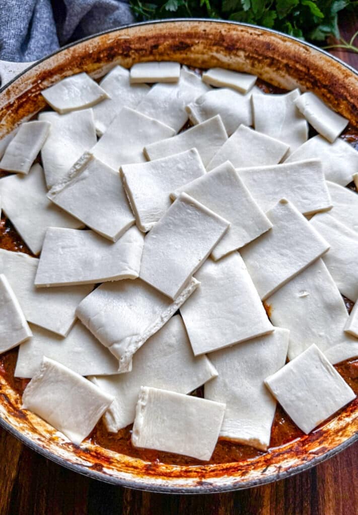 Strips of puff pastry over the top of guinness beef stew