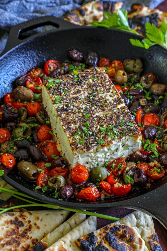 Baked Feta Dip Recipe served in a cast iron skillet.