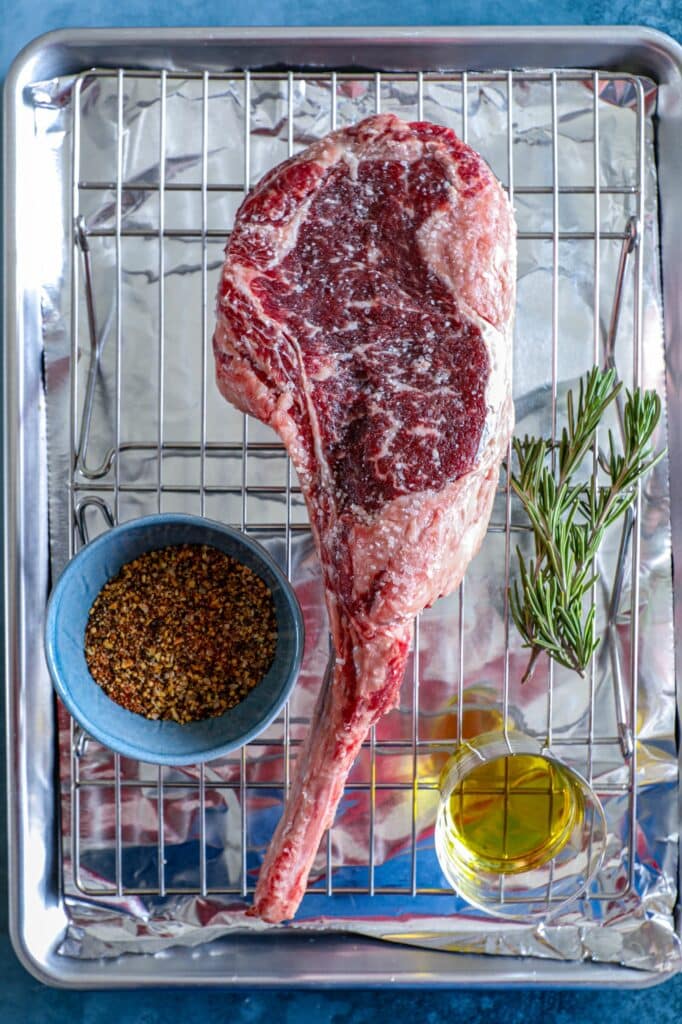 Ingredients used in reverse searing a tomahawk steak
