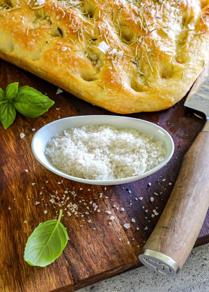 Smoked flaky maldon salt added to homemade focaccia