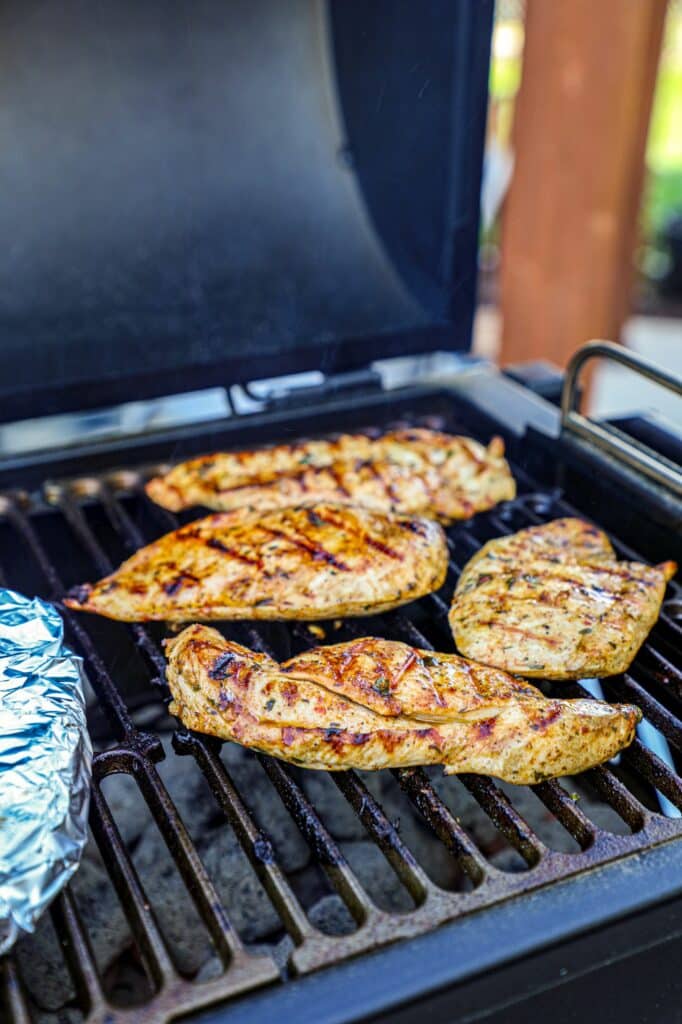 grilling the chicken breast for the pitas