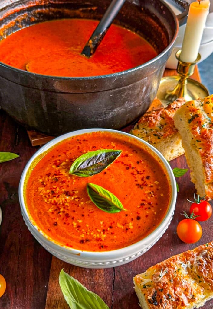 Oven roasted tomato soup paired with garlic bread focaccia