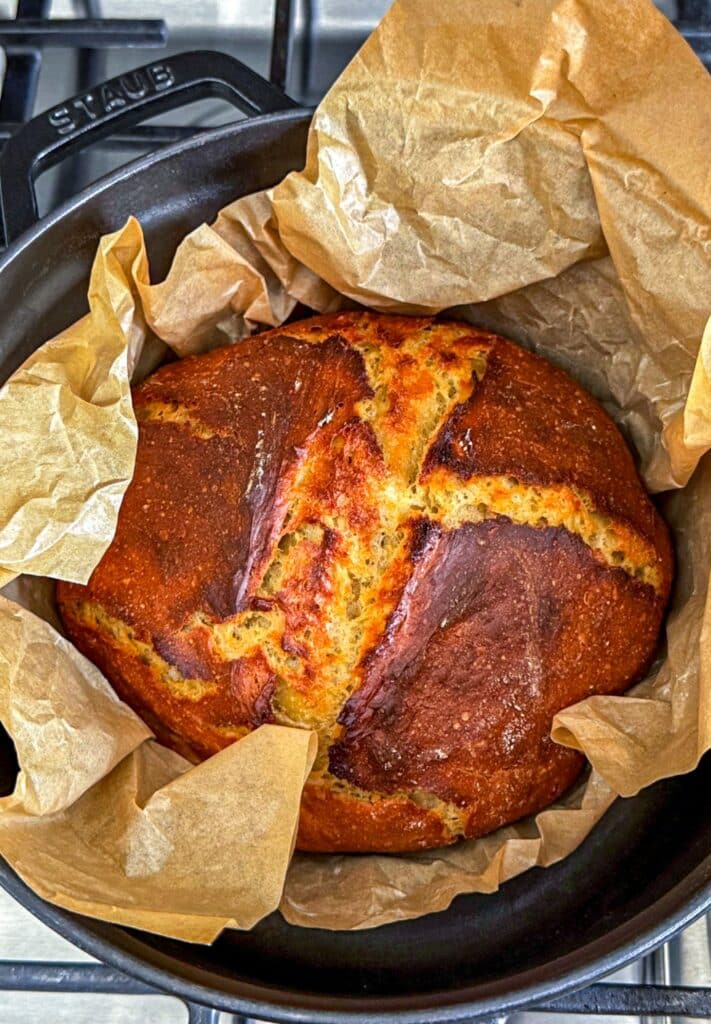 removing the baked einkorn bread from the oven