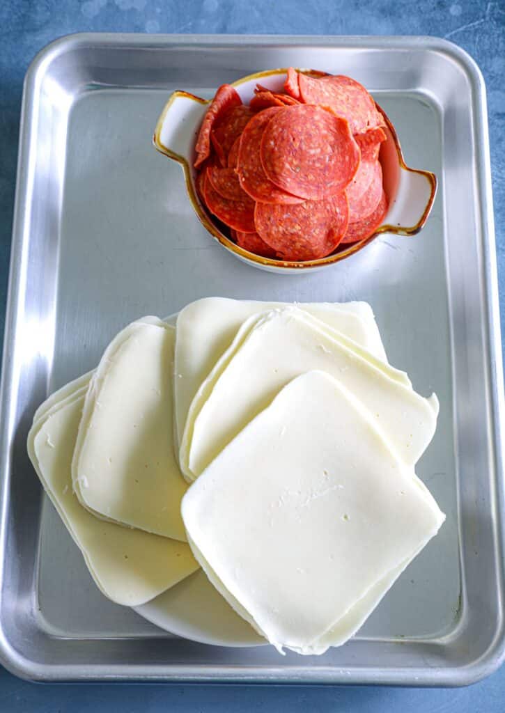 Mozzarella cheese slices and pepperoni