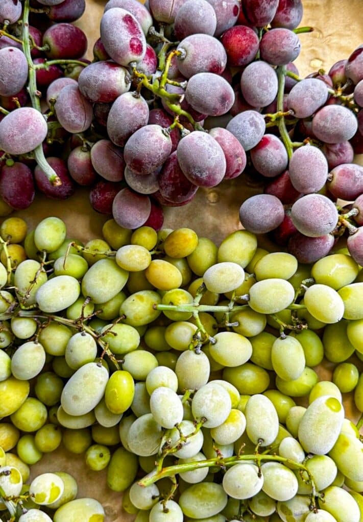 freezing the grapes on a baking sheet