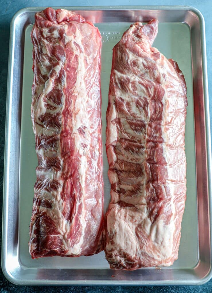 Baby back ribs on a baking sheet (uncooked)