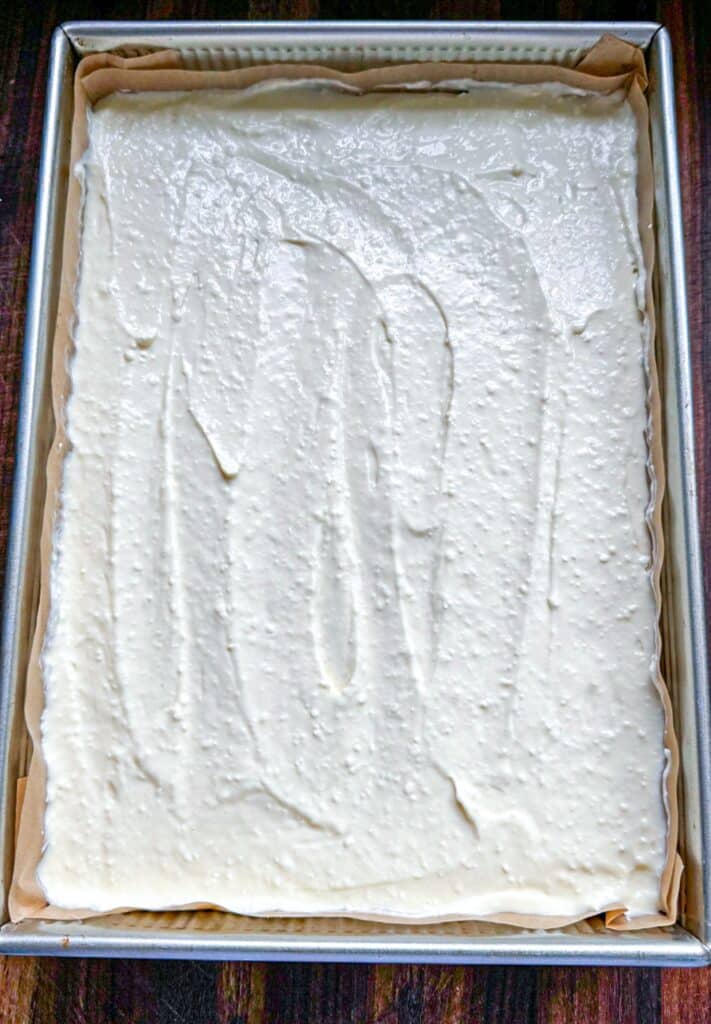 The cheesecake filling baked in the pan
