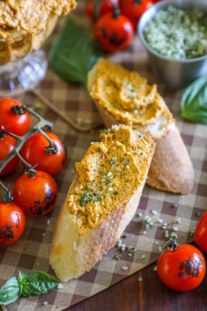 Spreading the butter onto fresh baguettes