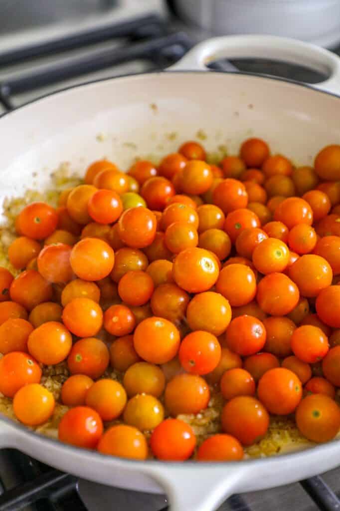 adding the sungold tomatoes