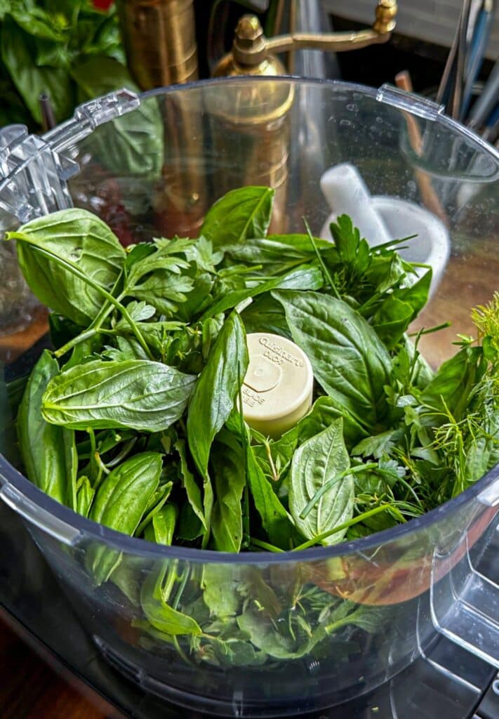 Chopping the herbs in a food processor