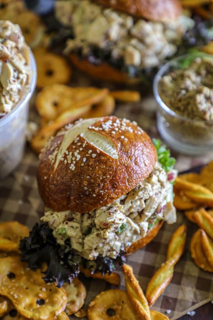 honey mustard chicken salad on a pretzel bun