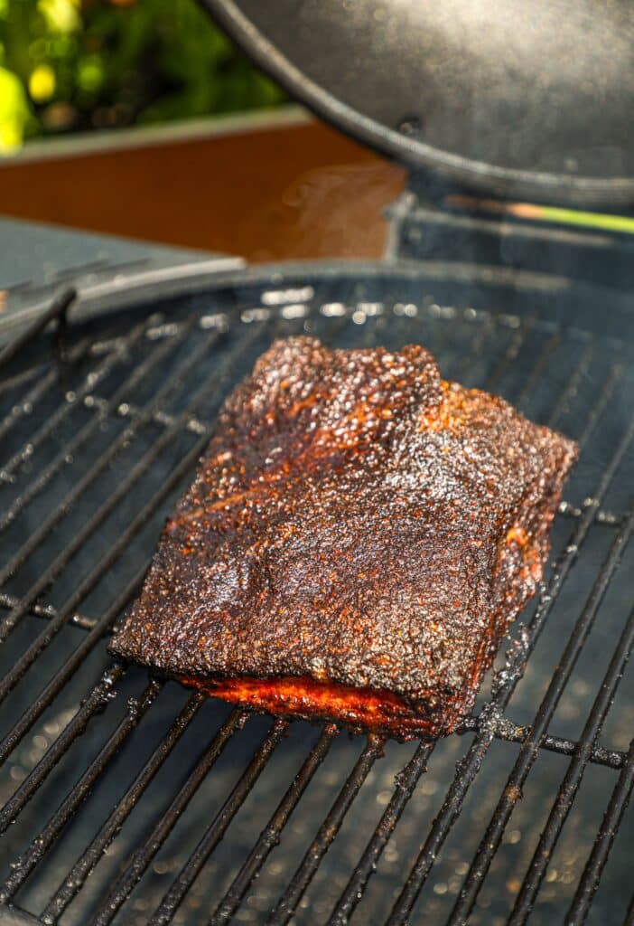 Smoked pork belly on a smoker