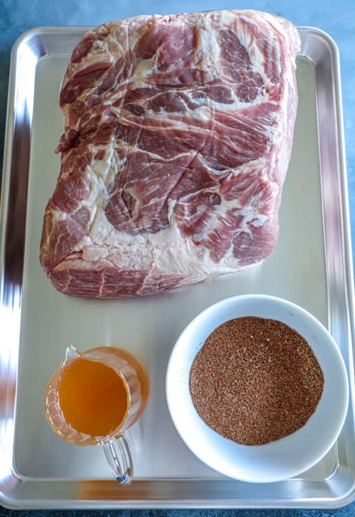 the pork shoulder, apple cider, and the homemade rub
