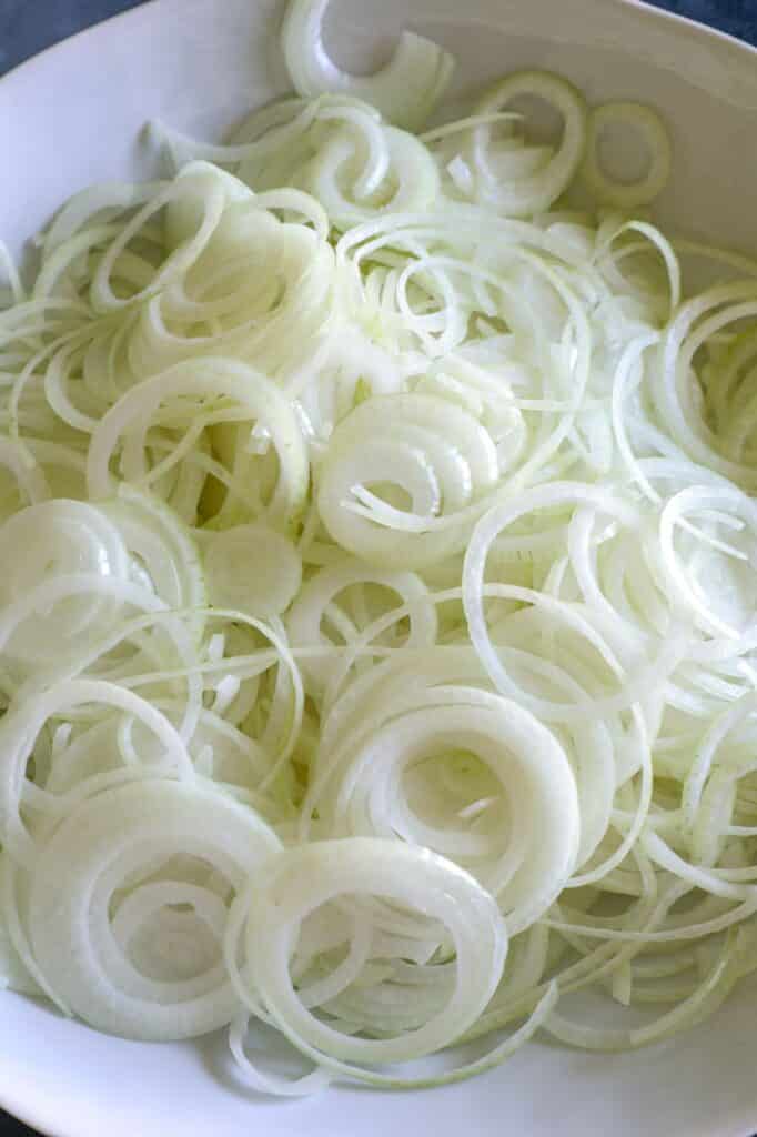 thinly sliced onions from a mandoline